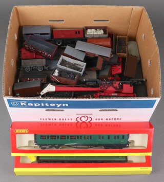 A collection of modern plastic OO gauge Hornby tenders and rolling stock 