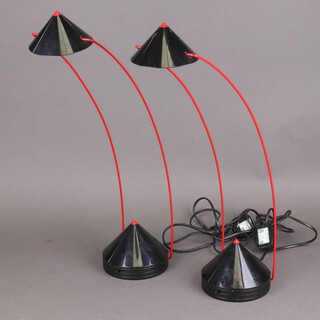 A pair of 1980's black plastic and red wire conical spot light lamps 