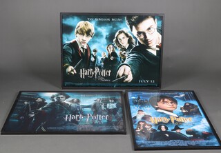 Harry Potter, 3 framed film quad posters, 1 portrait, 2 landscape, from "The Philosophiser's Stone", "The Goblet of Fire" and  "Order of The Phoenix" 76cm x 100cm 