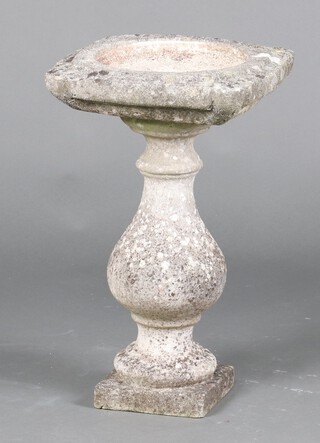 A square concrete bird bath raised on bulbous support 60cm h x 35cm w x35cm d together with a terracotta circular planter with ribbed decoration 