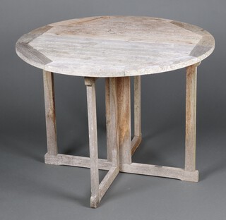 An octagonal slatted hardwood garden table 72cm h x 100cm x 100cm 