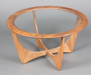 G-Plan, a mid-century teak Astro coffee table with plate glass top 54cm h x 84cm diam. 