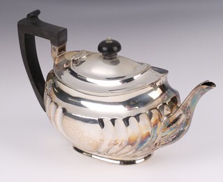 A Victorian oval silver teapot with demi-reeded decoration Sheffield 1900 by Atkin Brothers, 538 grams 