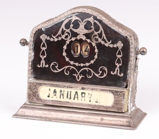 A silver and tortoiseshell arch shaped perpetual calendar, complete with rectangular plastic months cards, Birmingham 1911, 8cm h x 10cm w x 4cm d