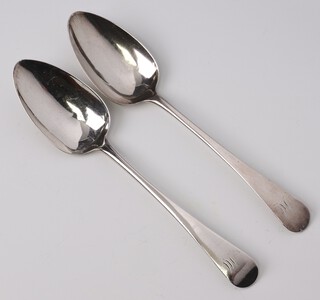 A pair of Georgian silver Old English pattern table spoons London 1810, maker Peter and William Bateman, monogrammed M, 118 grams 
