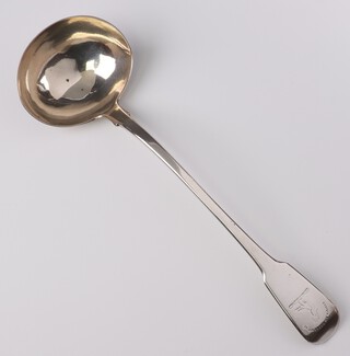 A William IV silver fiddle pattern soup ladle with armorial decoration, London 1824, maker William Edwards, 244 grams 