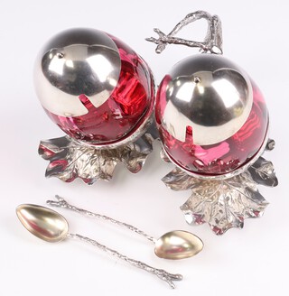An Edwardian novelty silver plated twin section preserve dish in the form of a leaf and an acorn with ruby glass liners 