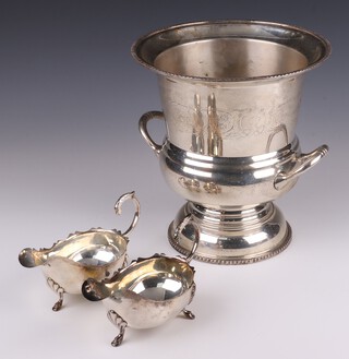 A silver plated twin handled wine cooler 28cm h and 2 large silver plated sauce boats 