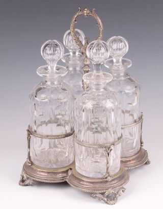 A 19th Century silver plated 4 bottle decanter stand with panel cut decanters (frame has a crack)