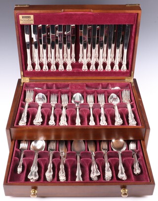 A Viners canteen of silver plated flatware comprising 12 dinner knives, 12 dinner forks, 4 serving spoons, 12 table spoons, 12 pudding spoons, 12 soup spoons, 12 fish knives, 12 fish forks, 12 pasty forks, 12 teaspoons, 12 coffee spoons, 12 tea knives, contained in a mahogany military style box 
