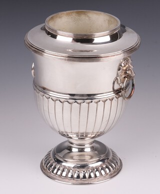 A silver plated wine cooler with lion ring mask handles, demi-reeded decoration, raised on a spreading foot 29cm 