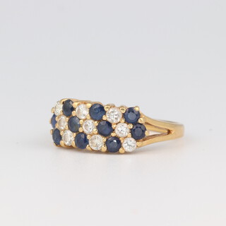 An 18ct yellow gold 3 row sapphire and diamond ring, the 9 diamonds each approx. 0.01ct, the 10 sapphires each approx, 0.01ct, size J 1/2, 3.2 grams 