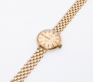 A lady's 9ct yellow gold Rotary wristwatch on a ditto bracelet, the case 20mm,  gross weight including movement and glass 16 grams 
