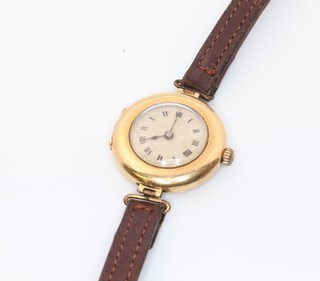 A lady's 18ct yellow gold wristwatch with enamelled dial and 27mm case, the gold back cover numbered 1090201