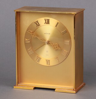 A Jaeger Le Coultre  8 day alarm clock with gilt dial, Roman numerals, contained in a gilt case 16cm x 12cm 