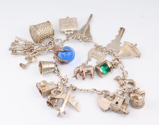 A silver charm bracelet and 3 loose charms, 18cm, gross weight 53 grams 