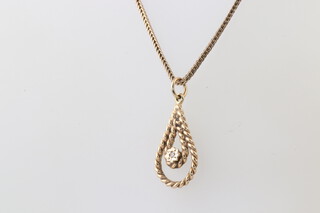 A 9ct yellow gold necklace 40cm with a ditto diamond set pear shaped pendant, the diamond 0.10ct, gross weight 4 grams 
