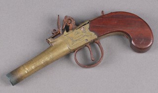 An Oakes of London, George III flintlock brass barrelled pocket pistol with walnut grip, the 7.5cm brass barrel with crowned P proof mark 