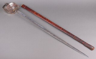 A George V, Infantry Officer's sword, the plain un-etched and un-numbered blade marked marked Proved, complete with leather scabbard 