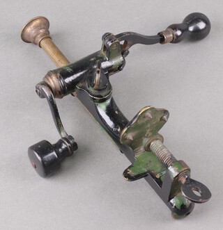 A 19th Century, bench mounted, iron and brass shot gun cartridge maker, marked 7009 12, 28cm 