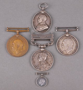 A group of 4 medals comprising 1919 India General Service medal 1 bar Afghan North West Frontier 1919, Calcutta mint issue named to 200147 Pte. F Jeffrey Royal West Kent Regiment, British War medal and Territorial Forces War medal, named 1231 Pte. F Jeffrey Royal West Kent Regt., a George V issue Territorial Forces Efficiency medal to 200147 Pte. F Jeffrey ..., together with a miniature British War medal 