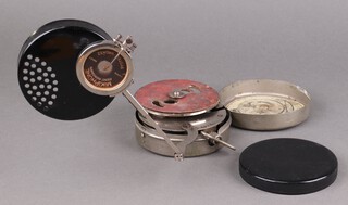 A 1920's Mikiphone System Vadasz pocket phonograph, nickel plated metal body contained in a bakelite case, 12cm