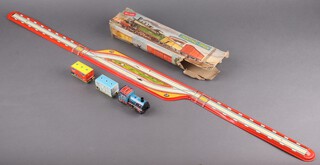 A German Technofix tin plate "shunting train" no.289 comprising foldout track, clockwork loco with key and 2 tenders 