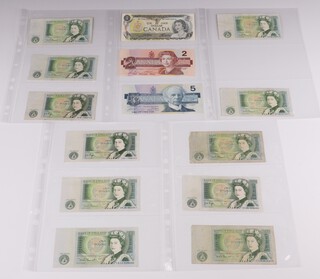 A collection of 11 Bank of England one pound notes in sleeves, in varying condition together with a Canadian one dollar note, two dollar note and a five dollar note 