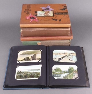 Five albums of early 19th Century postcards, the majority dating from 1900-1910 depicting landscapes, buildings, greetings cards, some social scenes 