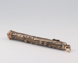 An Art Nouveau gilt metal propelling pencil with flower head decoration 
