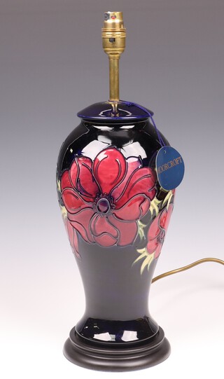 A Moorcroft baluster shaped blue glazed table lamp decorated poppies 35cm x 15cm 
