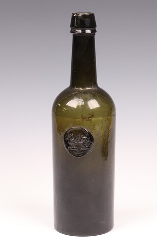 An 18th/19th Century Bristol green glass wine bottle with pictorial seal of a swan and rampant lion, base marked Powell Bristol 27cm 
