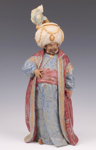 A Lladro gres figure of a standing Sultan, base impressed 2339, designed by Antonio Ramos 40cm 