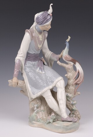 A Lladro figure of Hindu Prince with peacock no.1310  base impressed Q.P33M Lladro, by Salvador Debon, 37.5cm 