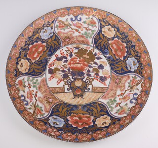 A 20th Century Imari charger decorated a lidded urn with panelled decoration 45cm diam. 