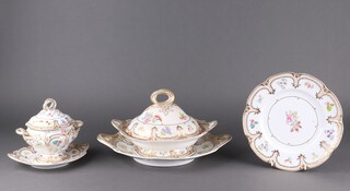 A 19th Century Rockingham style 38 piece porcelain dinner service, the bases numbered 1454, comprising twin handled tureen, cover and stand (all cracked), a pair of twin sauce tureens and covers (1 with cracked lid), twin handled sauce tureen stand, meat plate, 8 soup bowls (5 cracked), 17 dinner plates (1 cracked), 8 side plates (2 cracked), 4 tea plates (3 cracked) 