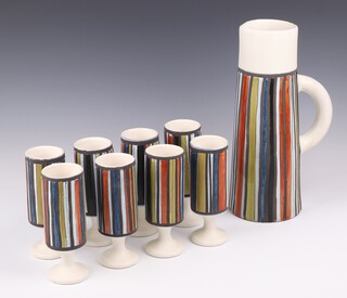 **Roger Capron (1922-2006), Vallouris France, a 9 piece studio pottery wine/lemonade set comprising jug 33cm h (slight chip to base) and 8 matching goblets with striped decoration ** Please Note - Artists Resale Rights may be payable on this lot 