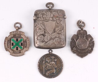 A Victorian silver vesta case Birmingham 1897 together with a silver St Christopher medal and 2 sports fobs 