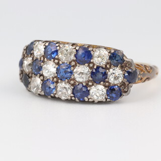 An 18ct yellow gold sapphire and diamond 3 row ring, comprising 13 brilliant cut sapphires each approx. 0.04ct and 10 brilliant cut diamonds each approx. 0.05ct, size O 1/2, 5.2 grams 