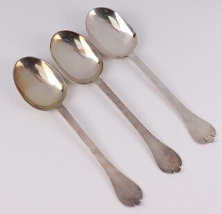 A pair of Britannia standard silver trefoil table spoons with rat tail decoration London 1896, and 1 other London 1898,  maker Thomas Bishton, 194 grams 