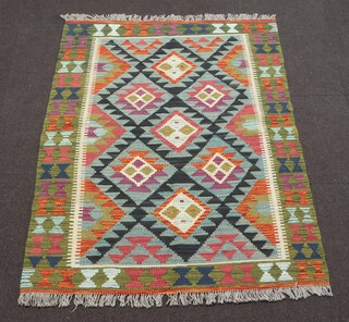 A green, black and turquoise ground Mamaina Kilim rug with diamond design 153cm x 103cm 