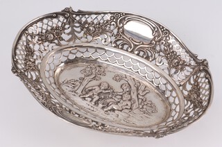 A Continental pierced and embossed silver oval bowl decorated cherubs marked 800, 21cm, 154 grams 