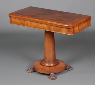 A William IV rectangular mahogany card table raised on a circular column and base on paw feet, 70cm 91cm h x 44cm d 