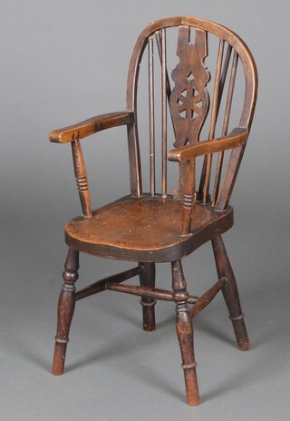 A child's 19th Century elm and beech stick back Windsor carver chair, raised on turned supports with H framed stretcher 66cm h x 30cm w x 27cm d 
