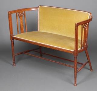 An Edwardian inlaid mahogany tub back 2 seat sofa upholstered in green material, raised on turned supports with double H framed stretcher 77cm h x 109cm w x 50cm d 