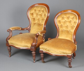 A Victorian mahogany open arm chair upholstered in gold buttoned material 98cm h, raised on turned supports together with a matching nursing chair 90cm h 