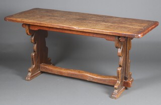An elm refectory dining table, the top formed of 3 planks, raised on turned supports with H framed stretcher 77cm h x 170cm l x 69cm d 
