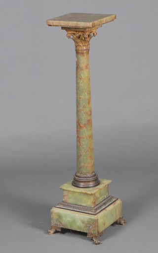 A green veined marble jardiniere stand with square top and gilt Corinthian capital, raised on a square base with gilt scroll feet 111cm h x 25cm