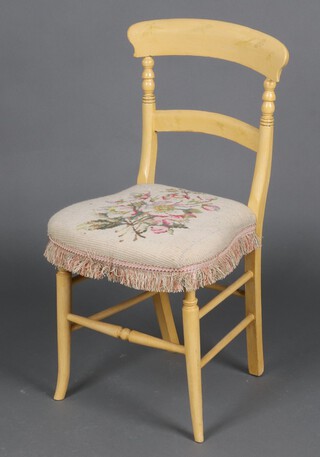 A Victorian yellow painted bar back chair decorated dragonflies and with Berlin woolwork seat 