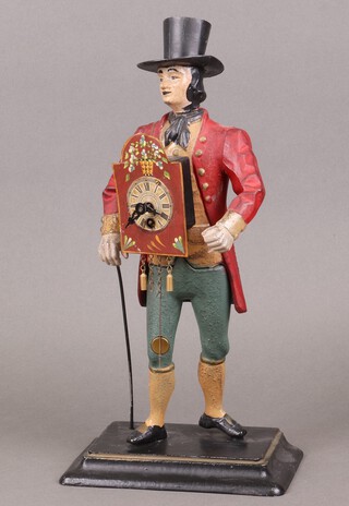 A reproduction metal Pedlar clock in the form of a standing gentleman 39cm h x 20cm w x 12cm d 